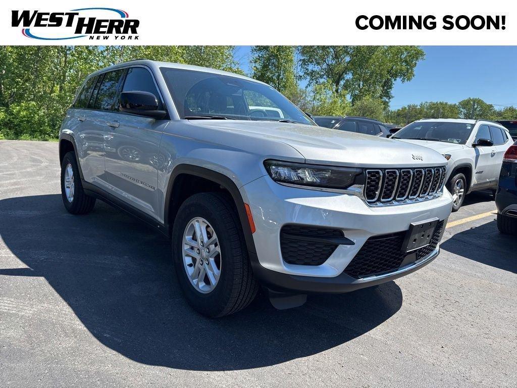 Used 2024 Silver Zynith Jeep Laredo image 1