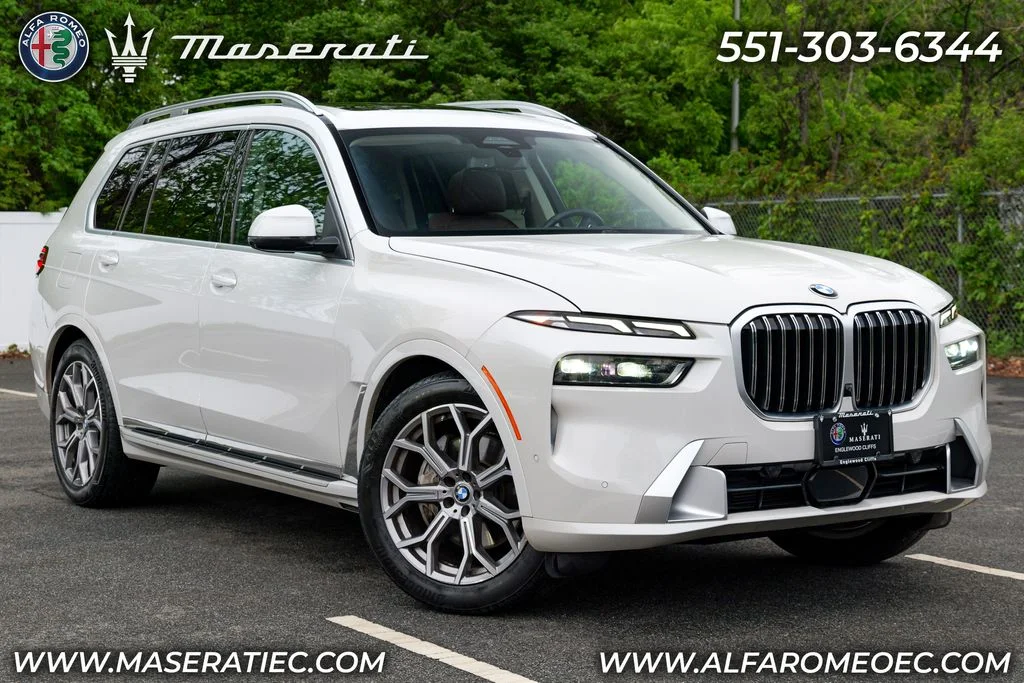 Used 2023 Mineral White Metallic BMW xDrive40i image 1