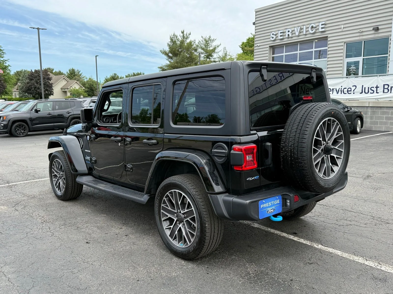 Used 2023 Black Clearcoat Jeep Sahara 4xe image 4