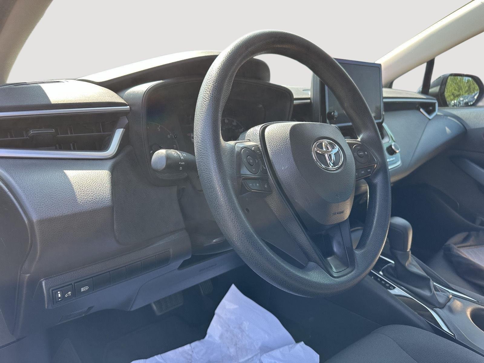 Used 2024 Midnight Black Metallic Toyota LE image 11