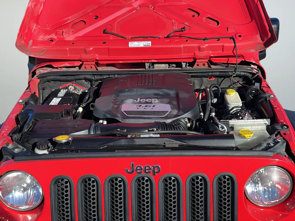 Used 2013 Red Jeep Unlimited Sport image 39