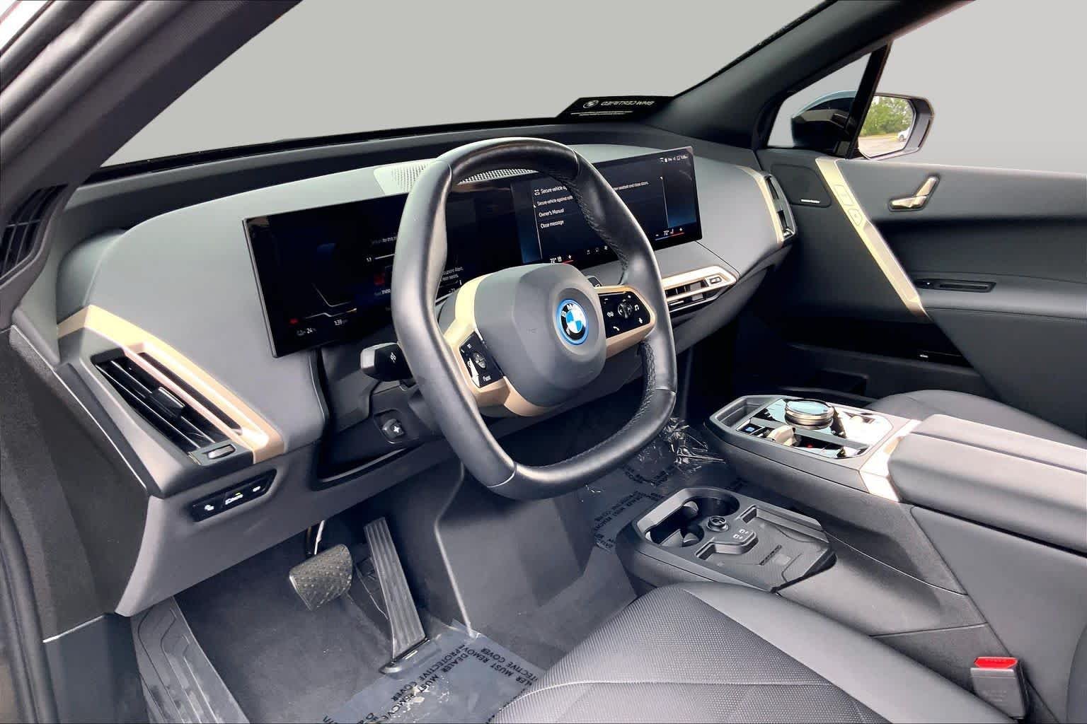 Used 2024 Black Sapphire Metallic BMW xDrive50 image 16