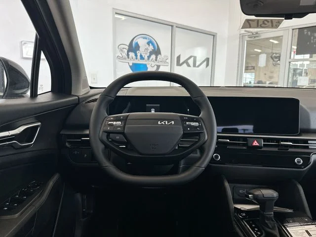 New 2026 Ebony Black Kia LX image 13
