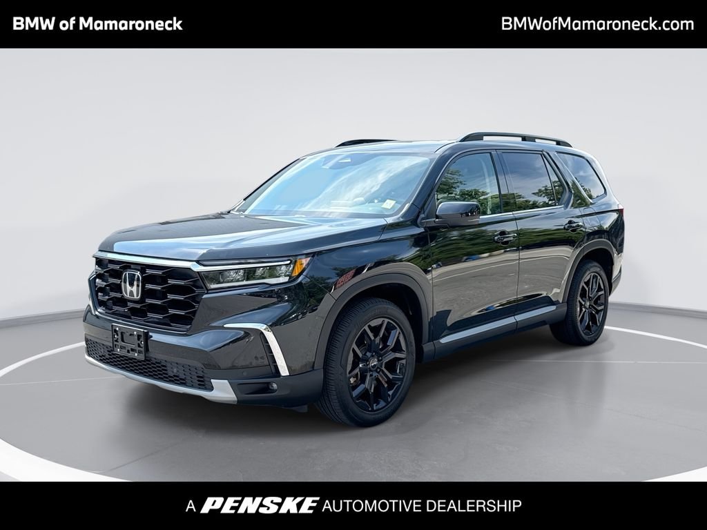 Used 2025 Crystal Black Pearl Honda Touring image 1