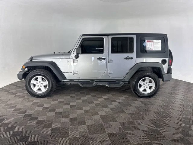 Used 2014 Silver Jeep Unlimited Sport image 10