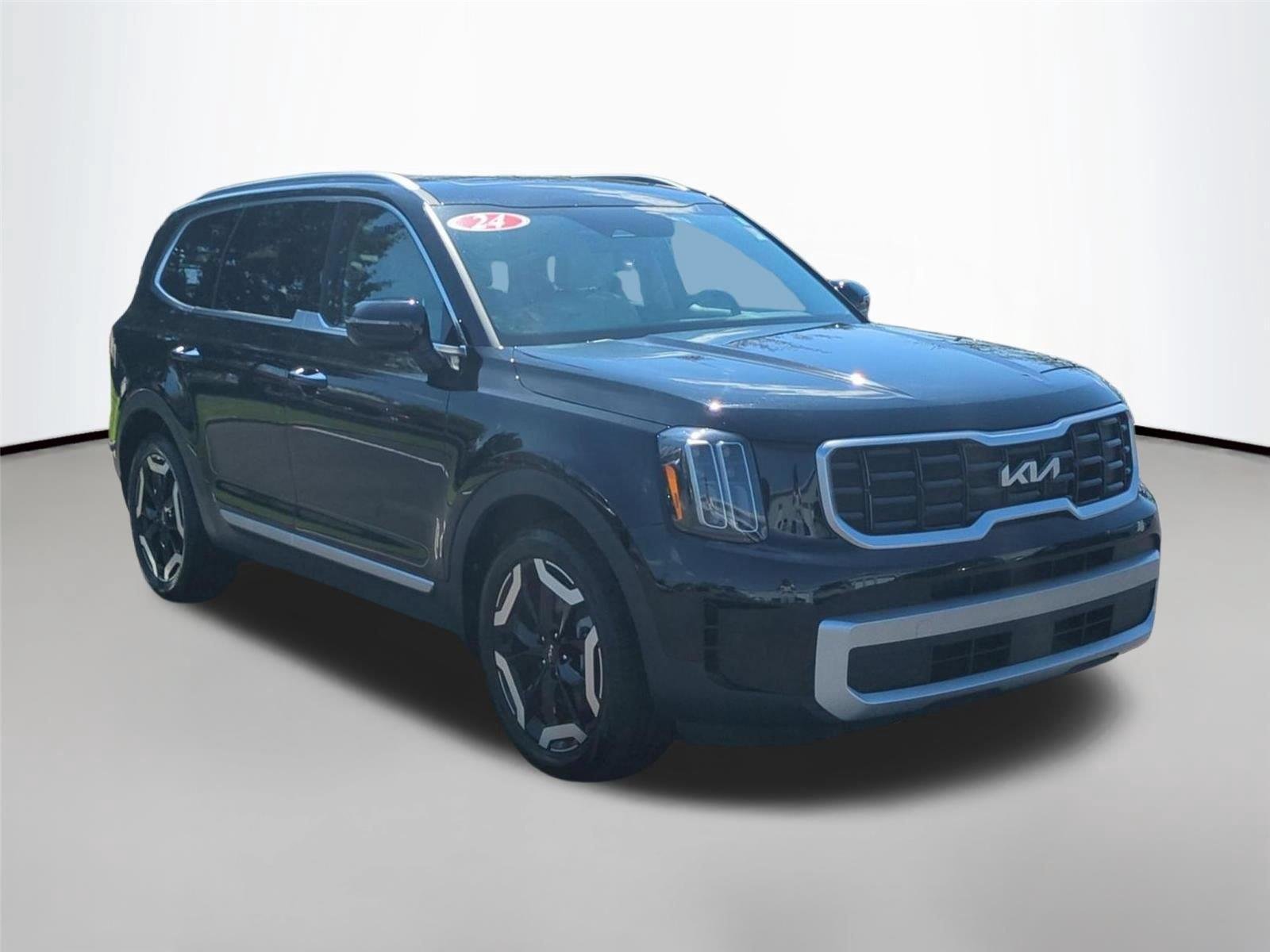 Used 2024 Ebony Black Kia S image 7