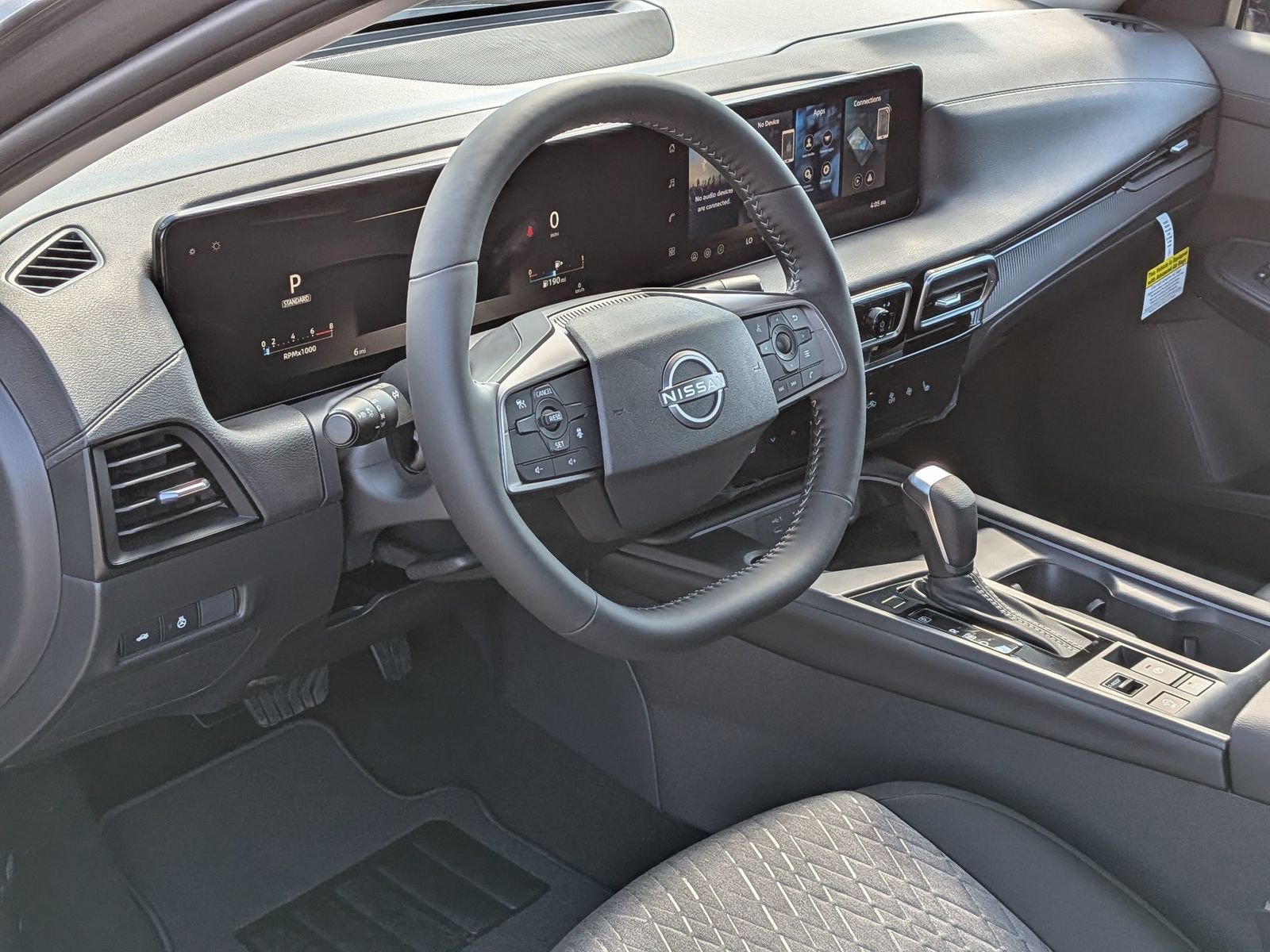 New 2026 Gun Metallic Nissan SV image 12