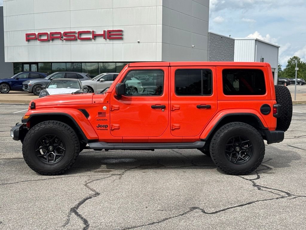 Used 2019 Orange Jeep Unlimited Sahara image 2