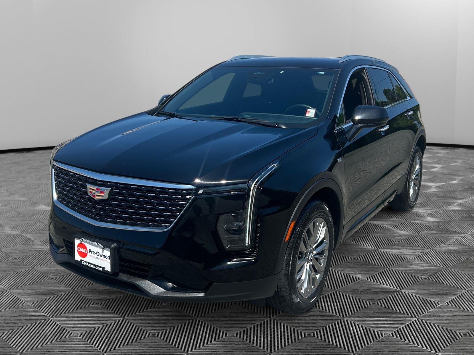 Used 2025 Stellar Black Metallic Cadillac AWD Premium Luxury image 1