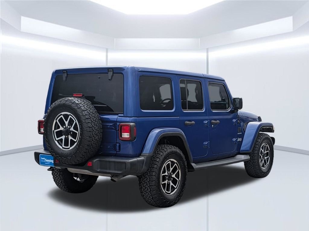 Used 2019 Blue Jeep Unlimited Sahara image 6