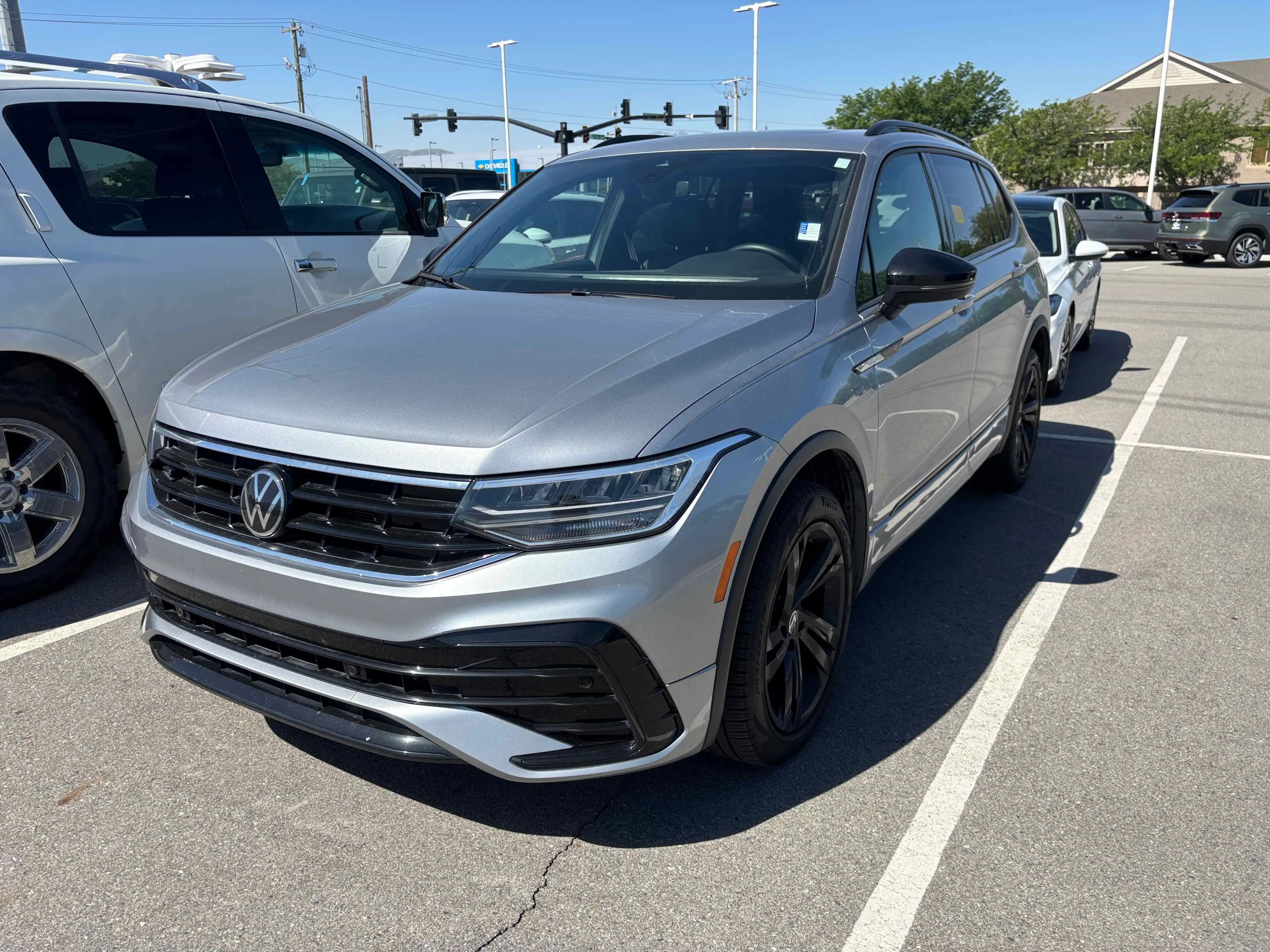 Used 2024 Silver Volkswagen SE R-Line Black image 2