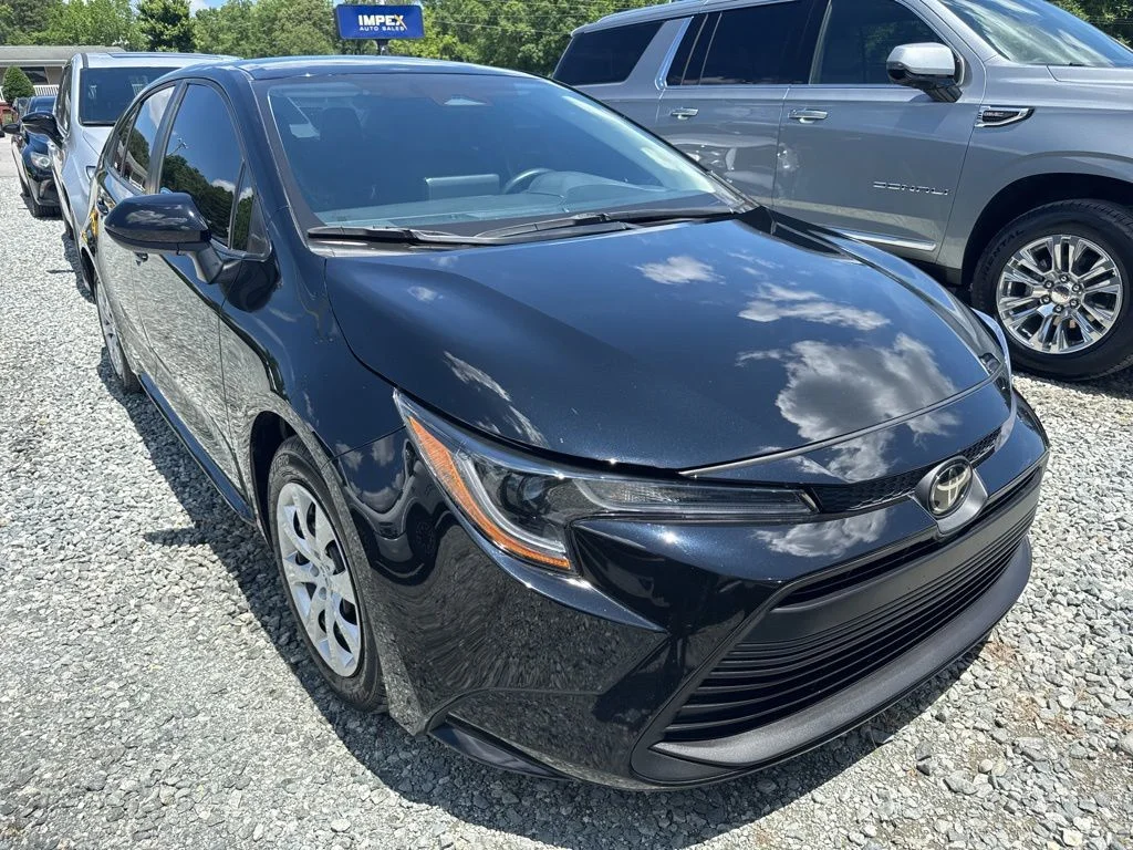 Used 2024 Black Toyota LE image 2