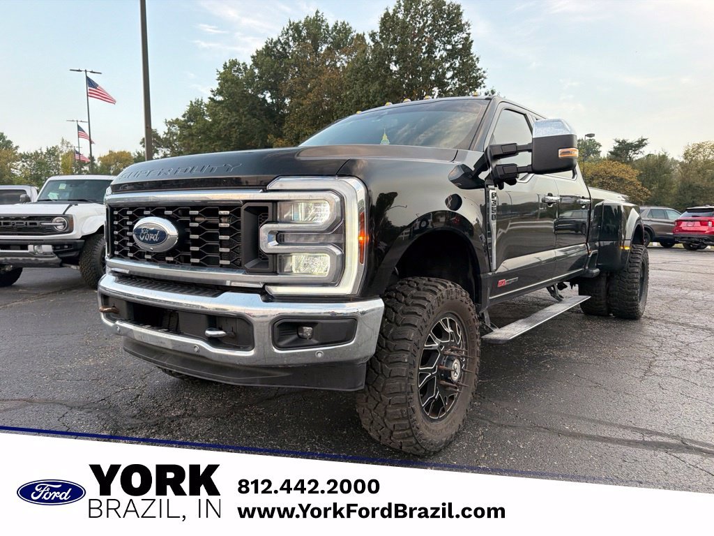 Used 2024 Black Metallic Ford Lariat image 1