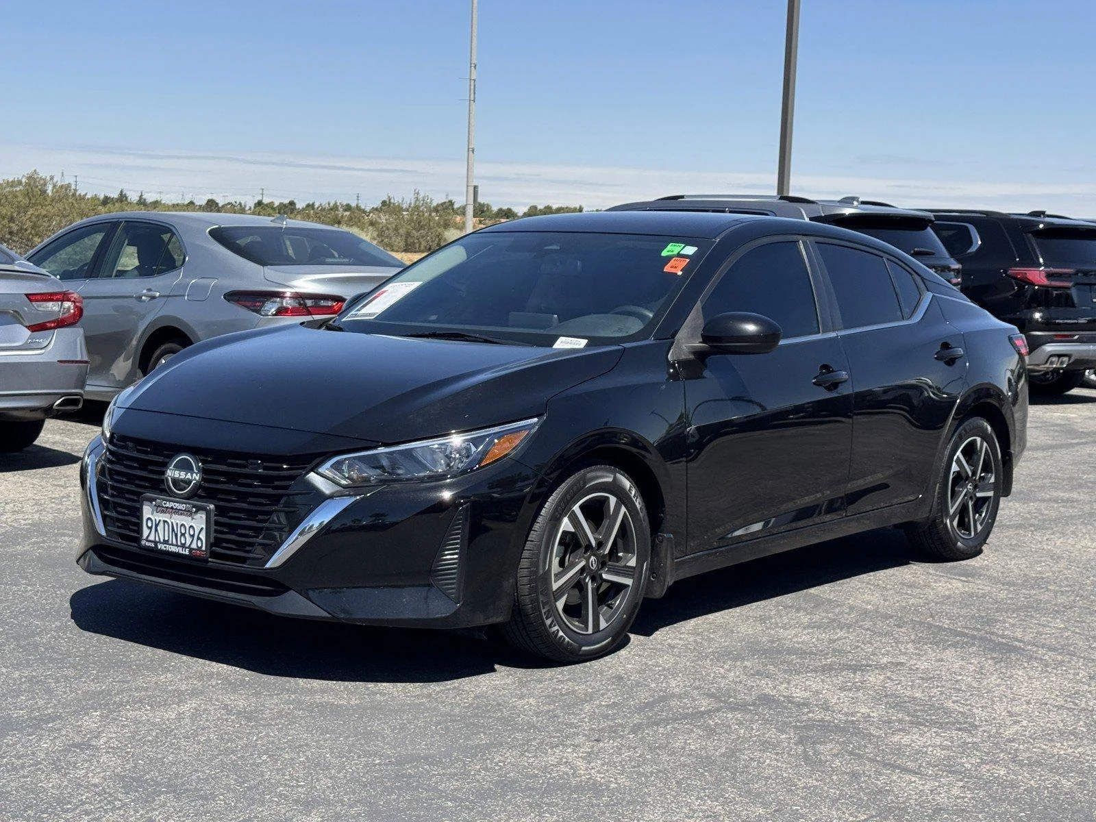 Used 2024 Super Black Nissan SV image 3
