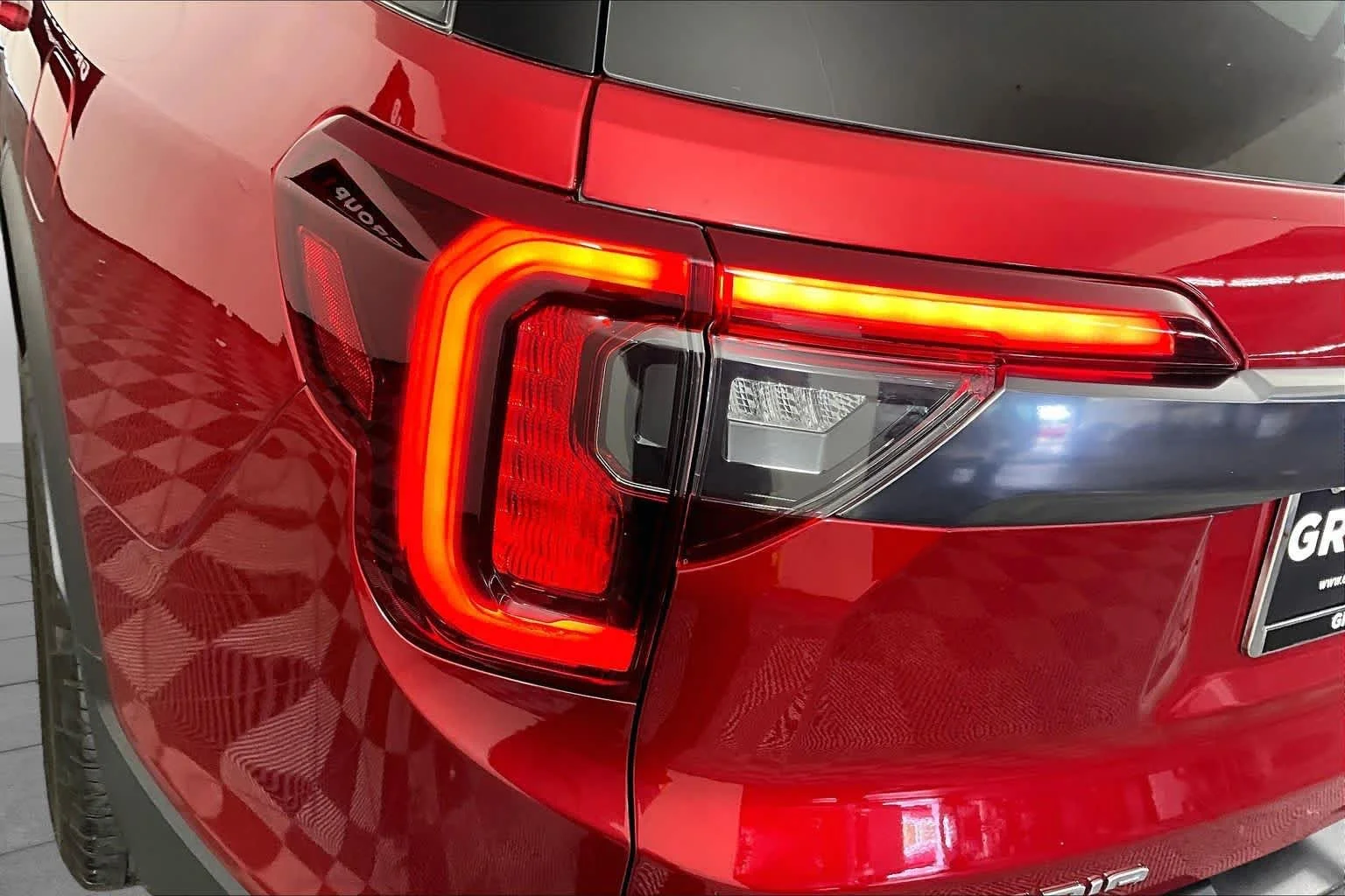 Used 2023 VOLCANIC RED TINCOAT GMC AT4 image 55