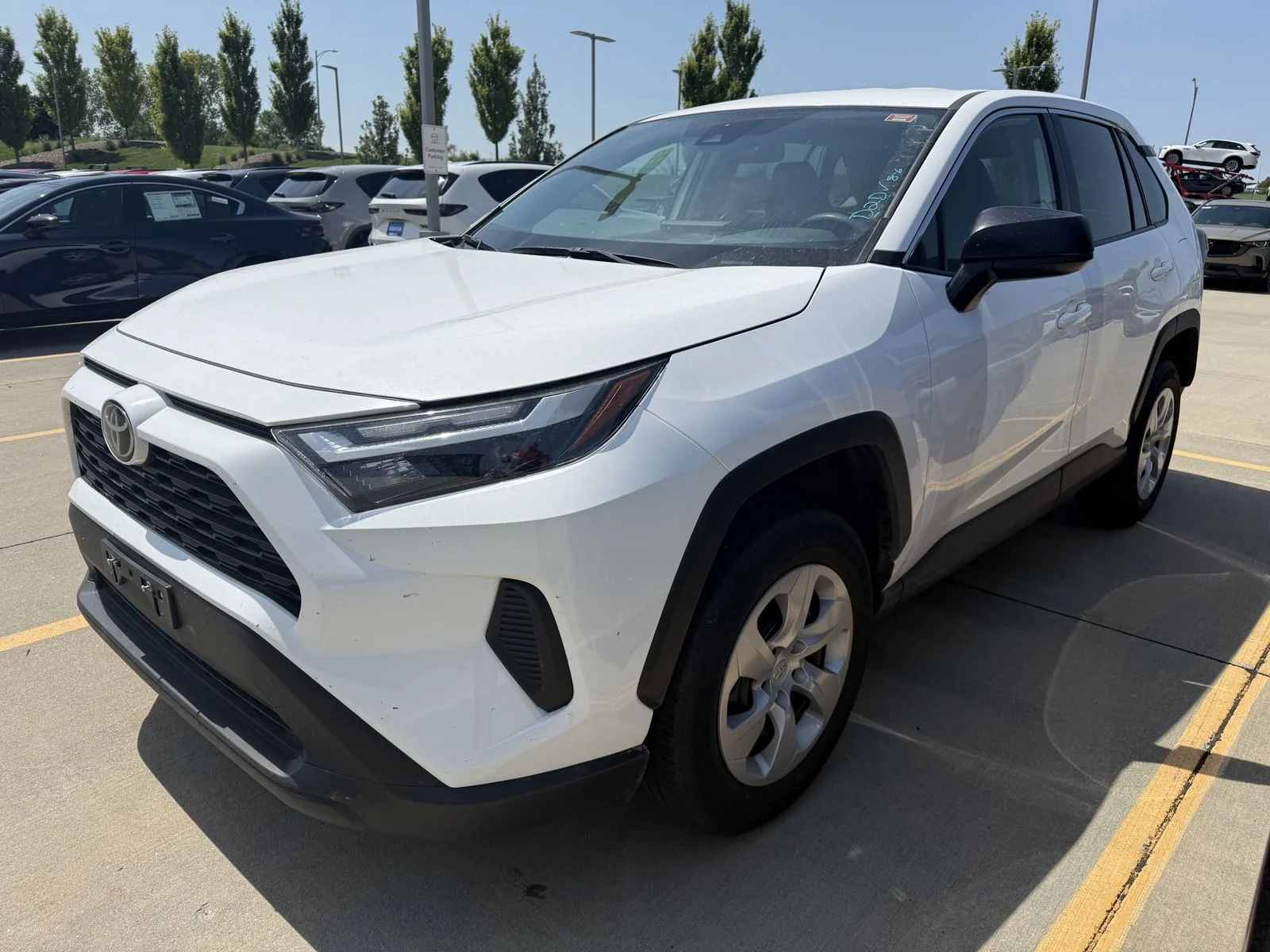 Used 2025 White Toyota LE image 1