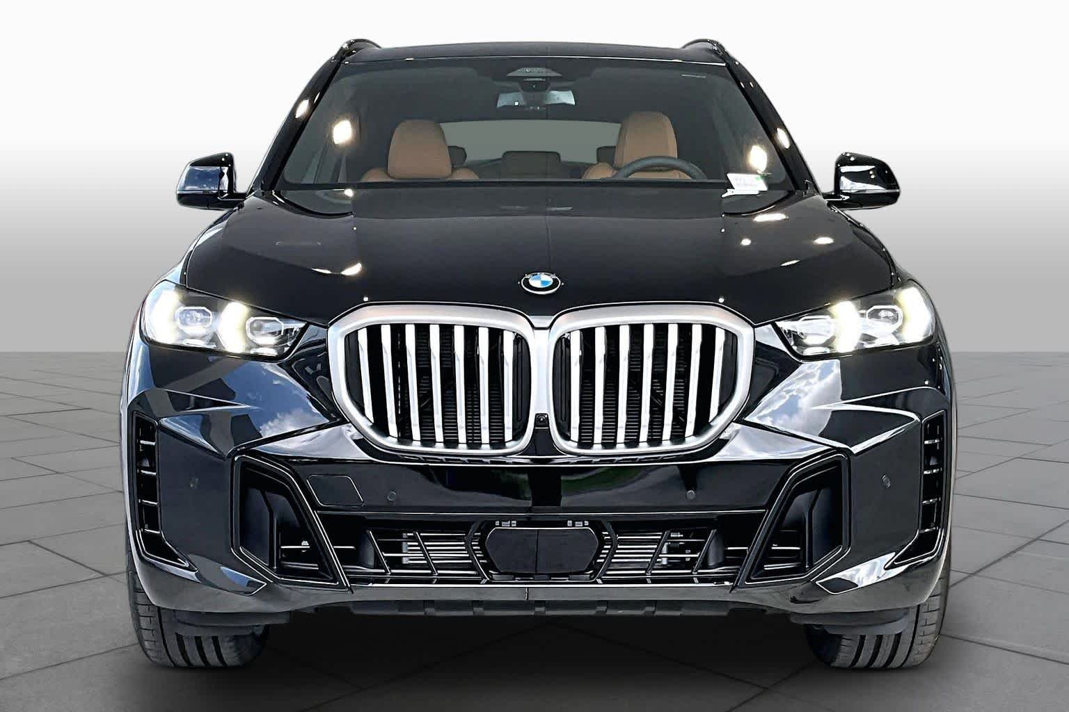 New 2026 Black Sapphire Metallic BMW sDrive40i image 3