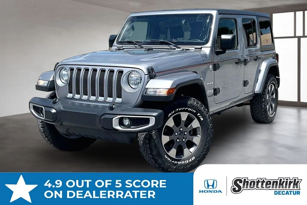 Used 2019 Silver Jeep Unlimited Sahara image 1