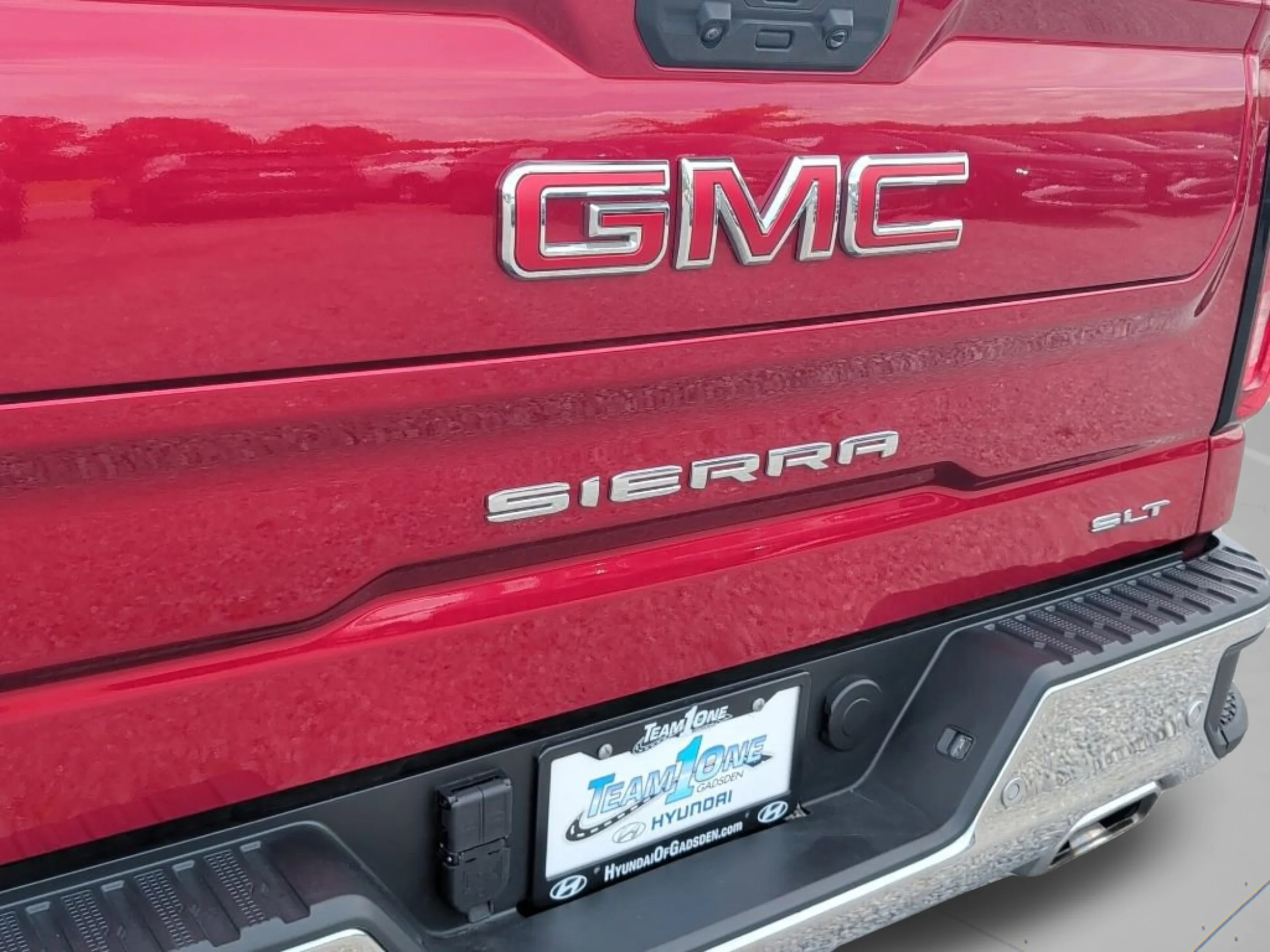 Used 2025 Volcanic Red Tintcoat GMC SLT image 48