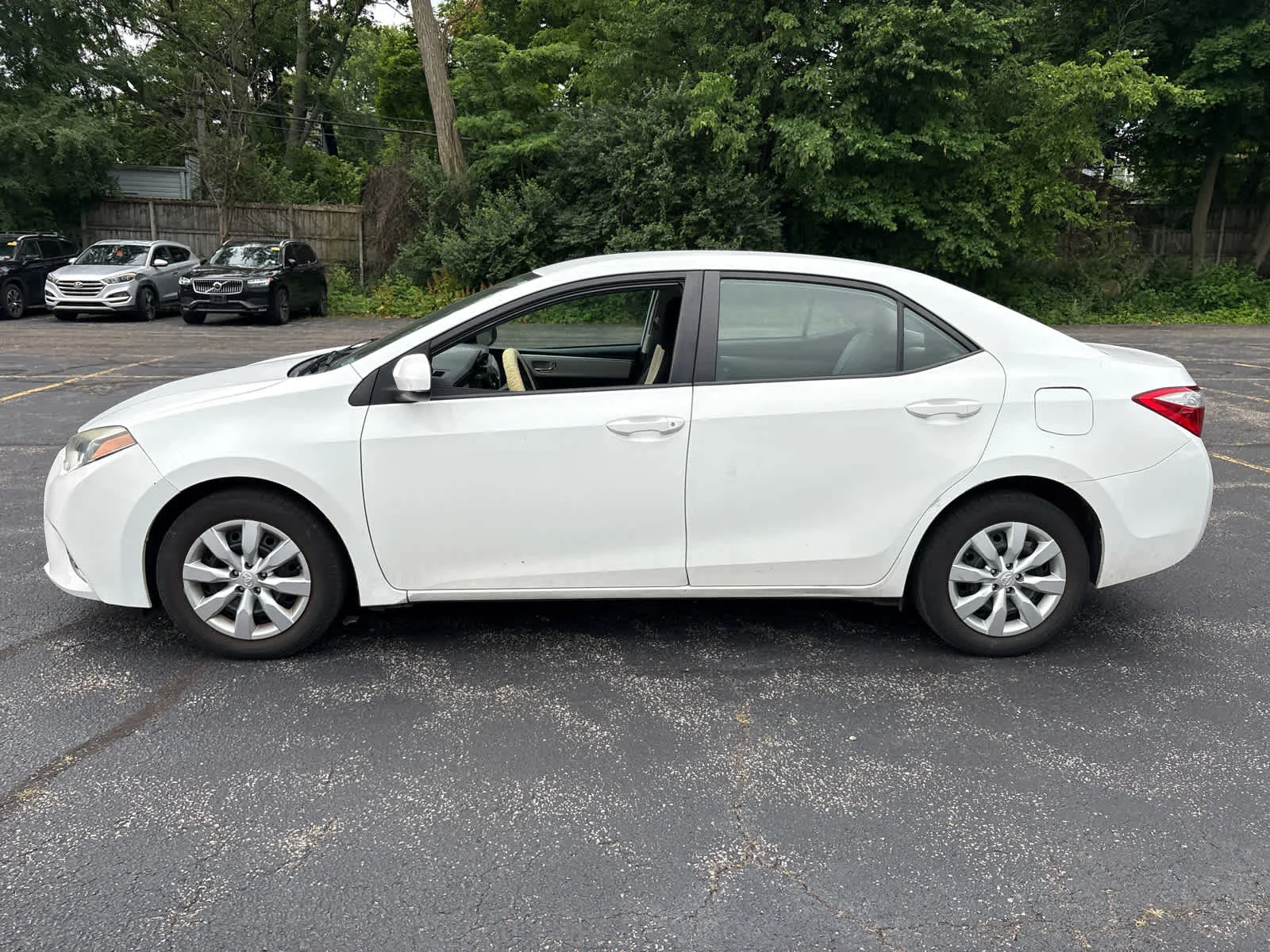 Used 2015 Super White Toyota LE image 3