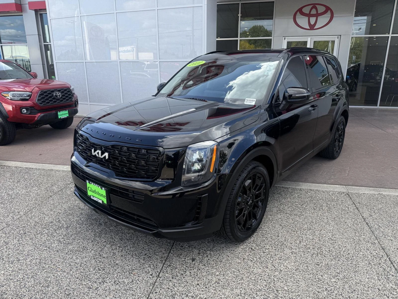 Used 2022 Ebony Black Kia EX image 2