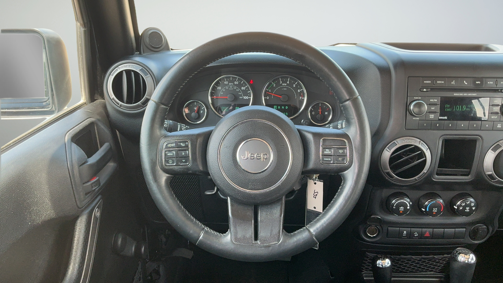 Used 2013 Black Jeep Unlimited Sport image 9