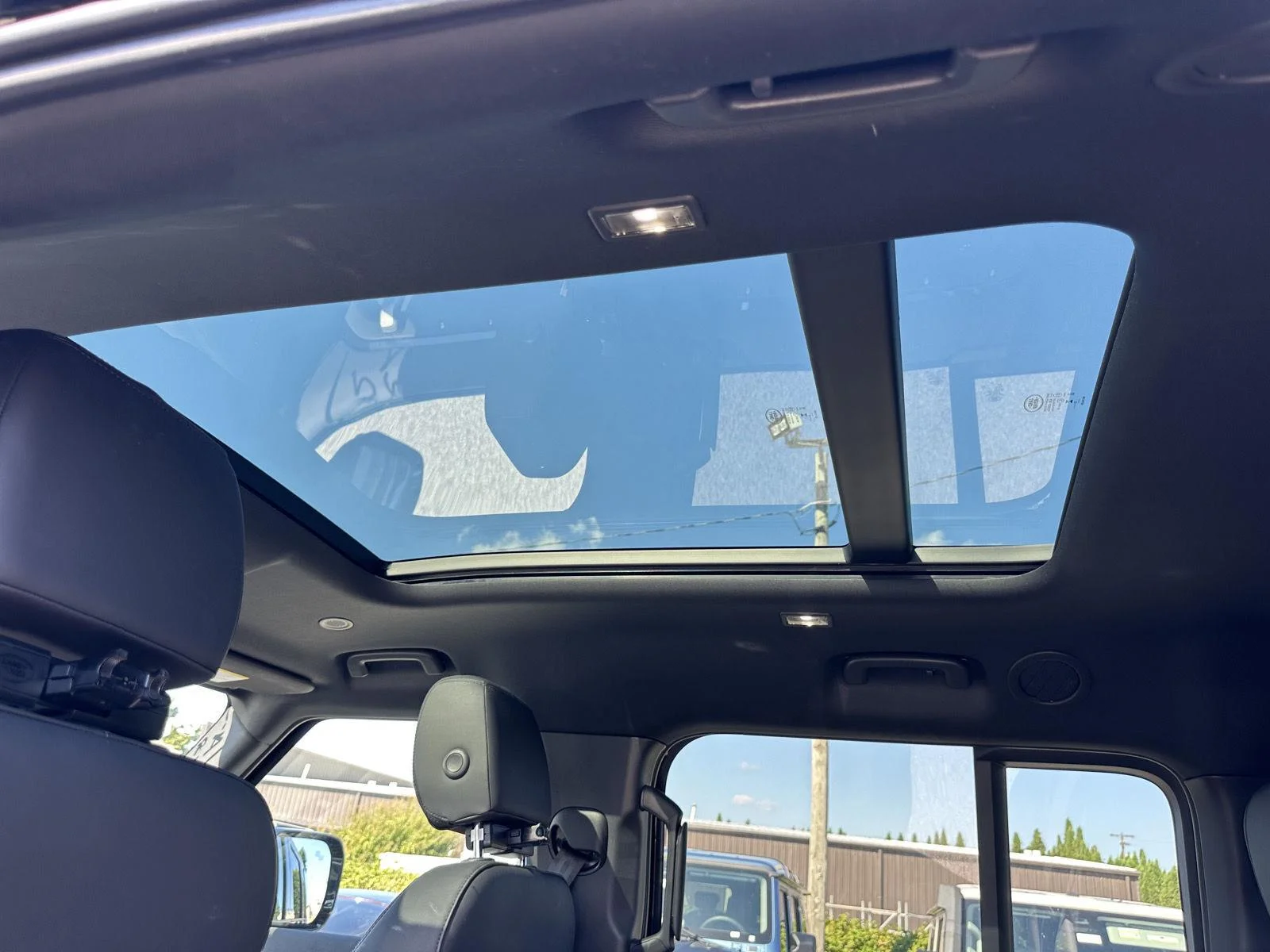 Used 2024 Santorini Black Metallic Land Rover Outbound image 40