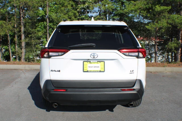 Used 2021 Super White Toyota LE image 14