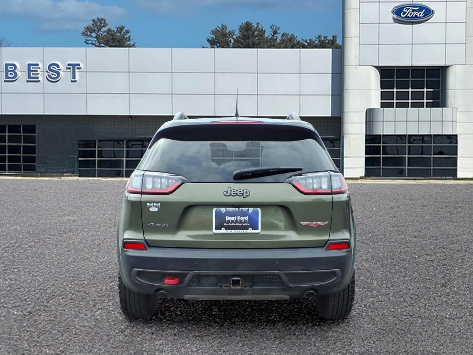 Used 2021 Olive Green Pearlcoat Jeep Trailhawk image 5