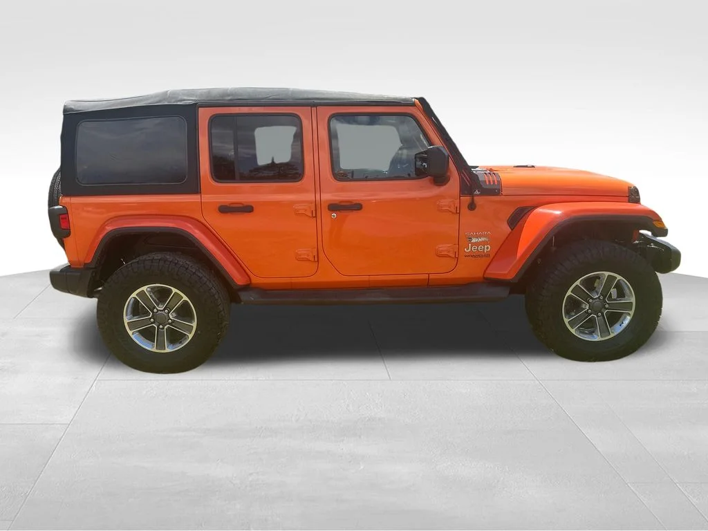 Used 2018 Orange Jeep Unlimited Sahara image 26