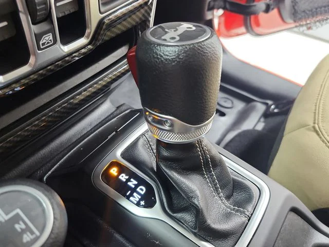 Used 2018 Orange Jeep Unlimited Sahara image 29