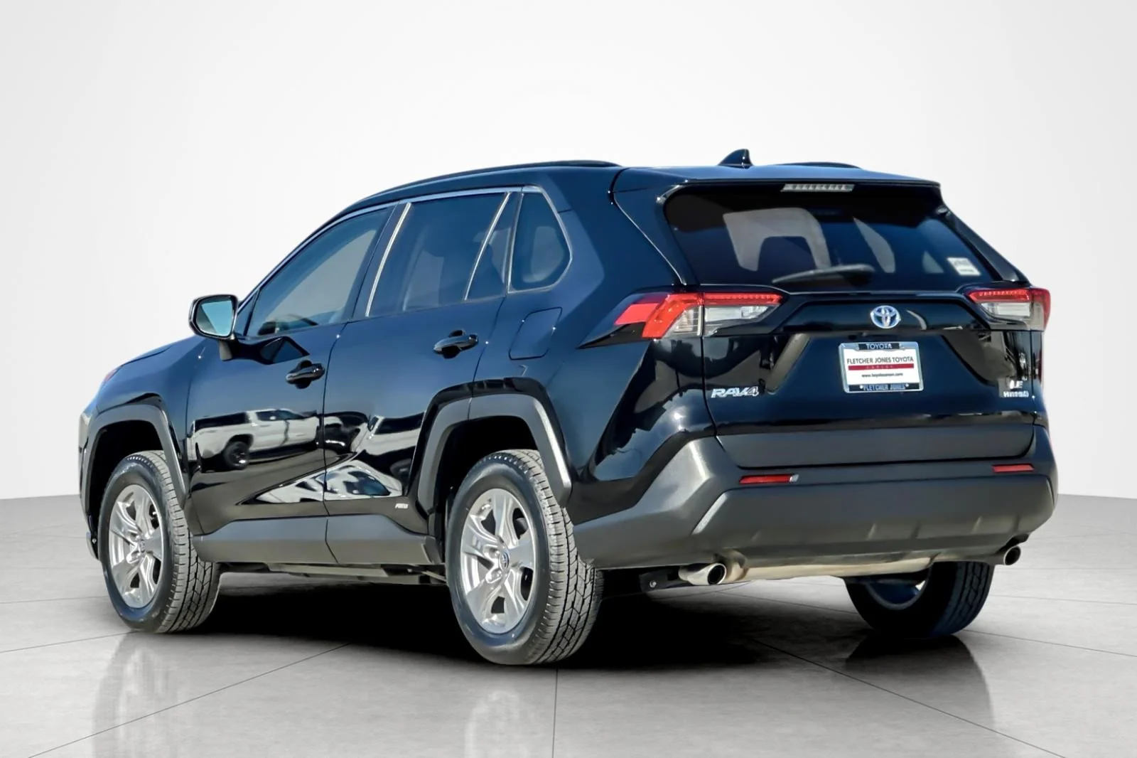 Used 2024 Midnight Black Metallic Toyota Hybrid LE image 3