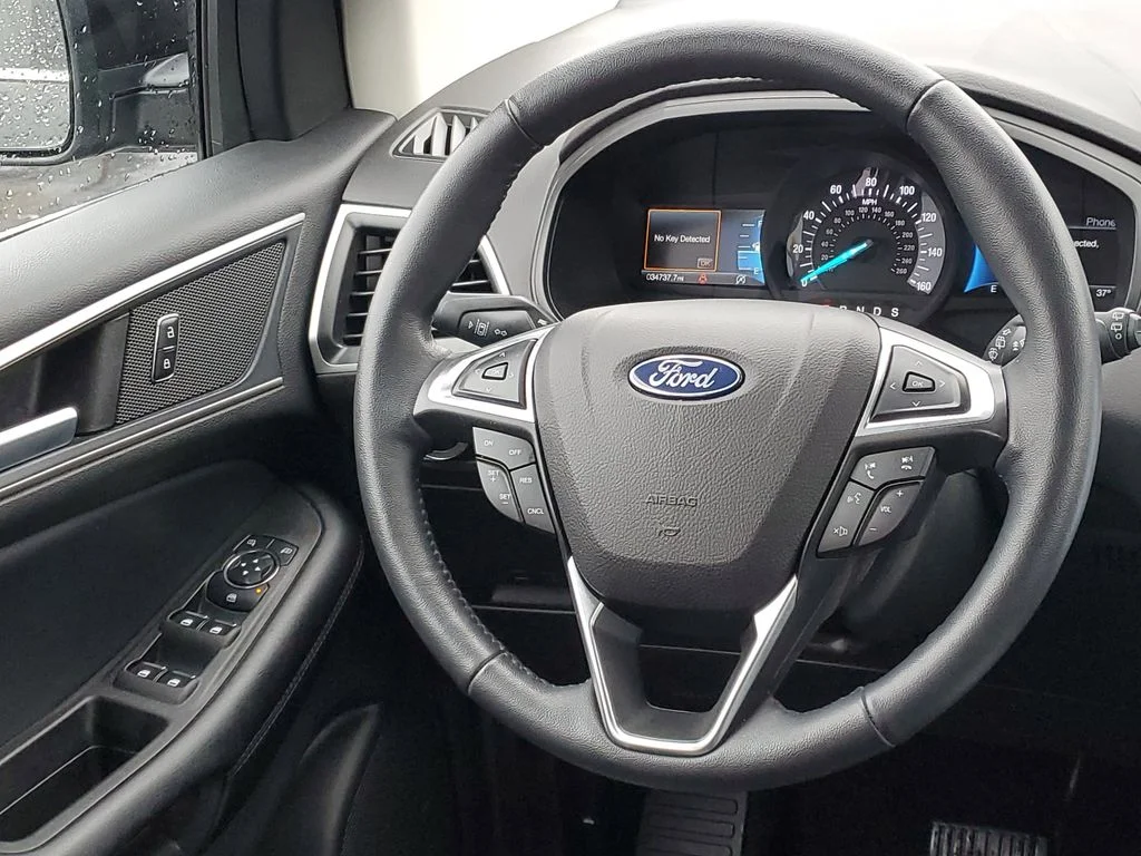 Certified Used 2023 Agate Black Metallic Ford SEL image 25