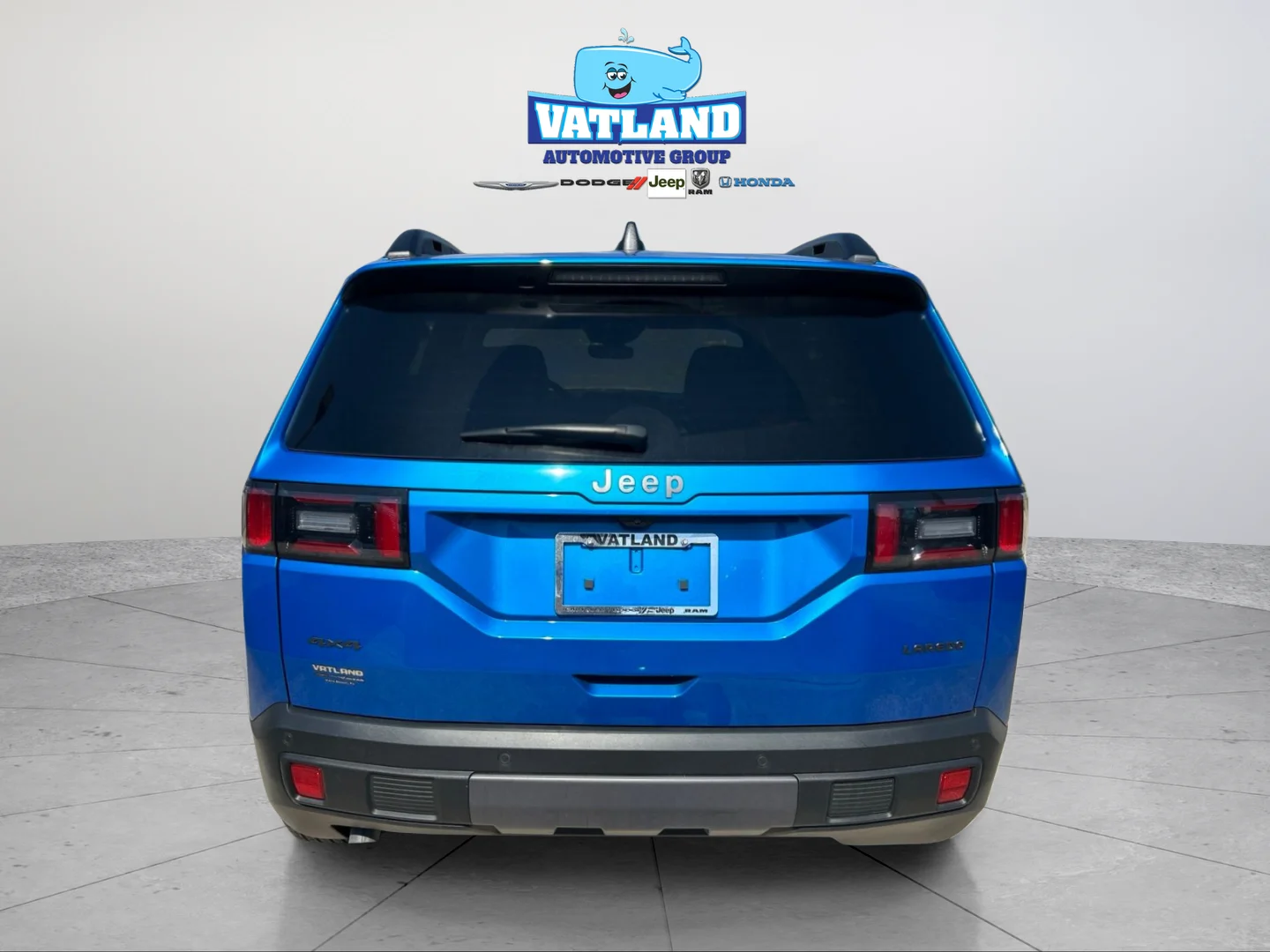 Used 2026 Blue Pearl Jeep Laredo image 4