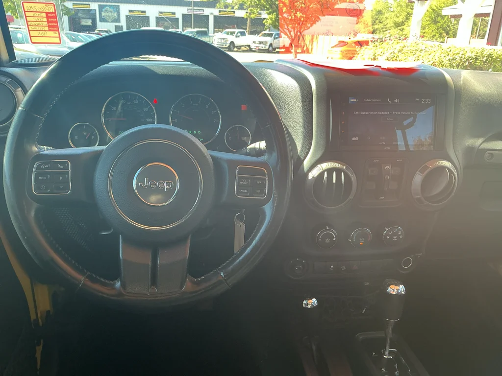 Used 2015 Baja Yellow Jeep Sport image 10