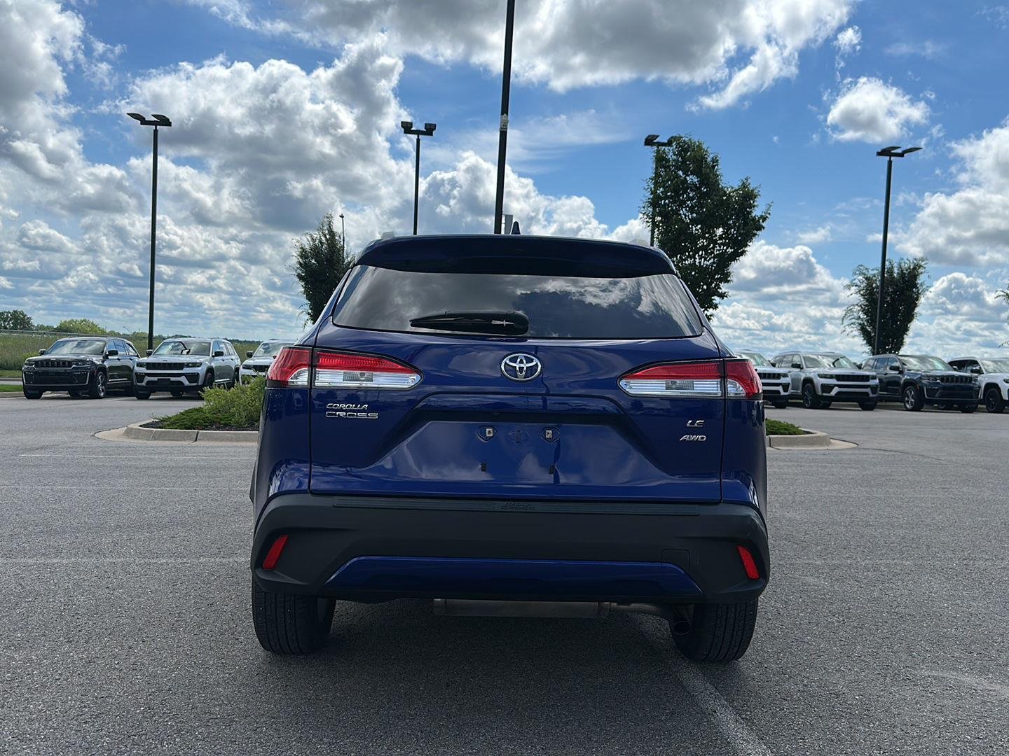 Used 2022 Blue Crush Metallic Toyota LE image 3