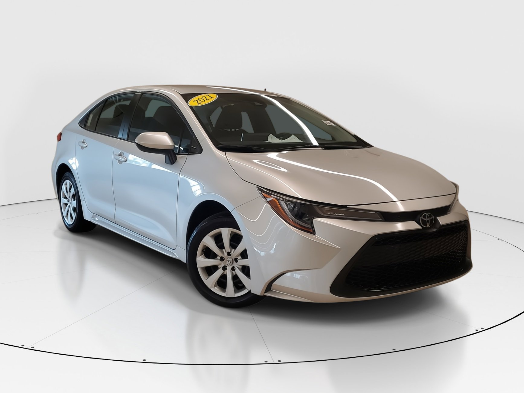 Used 2021 Classic Silver Metallic Toyota LE image 2