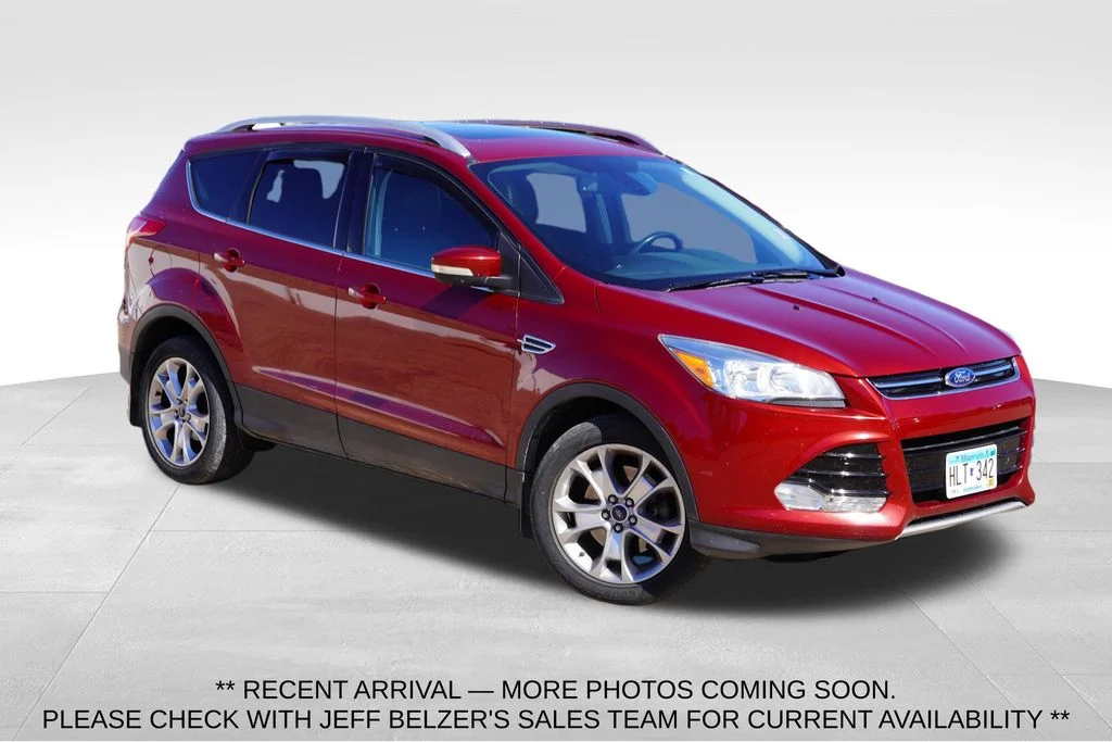 Used 2016 Ruby Red Metallic Ford Titanium image 1