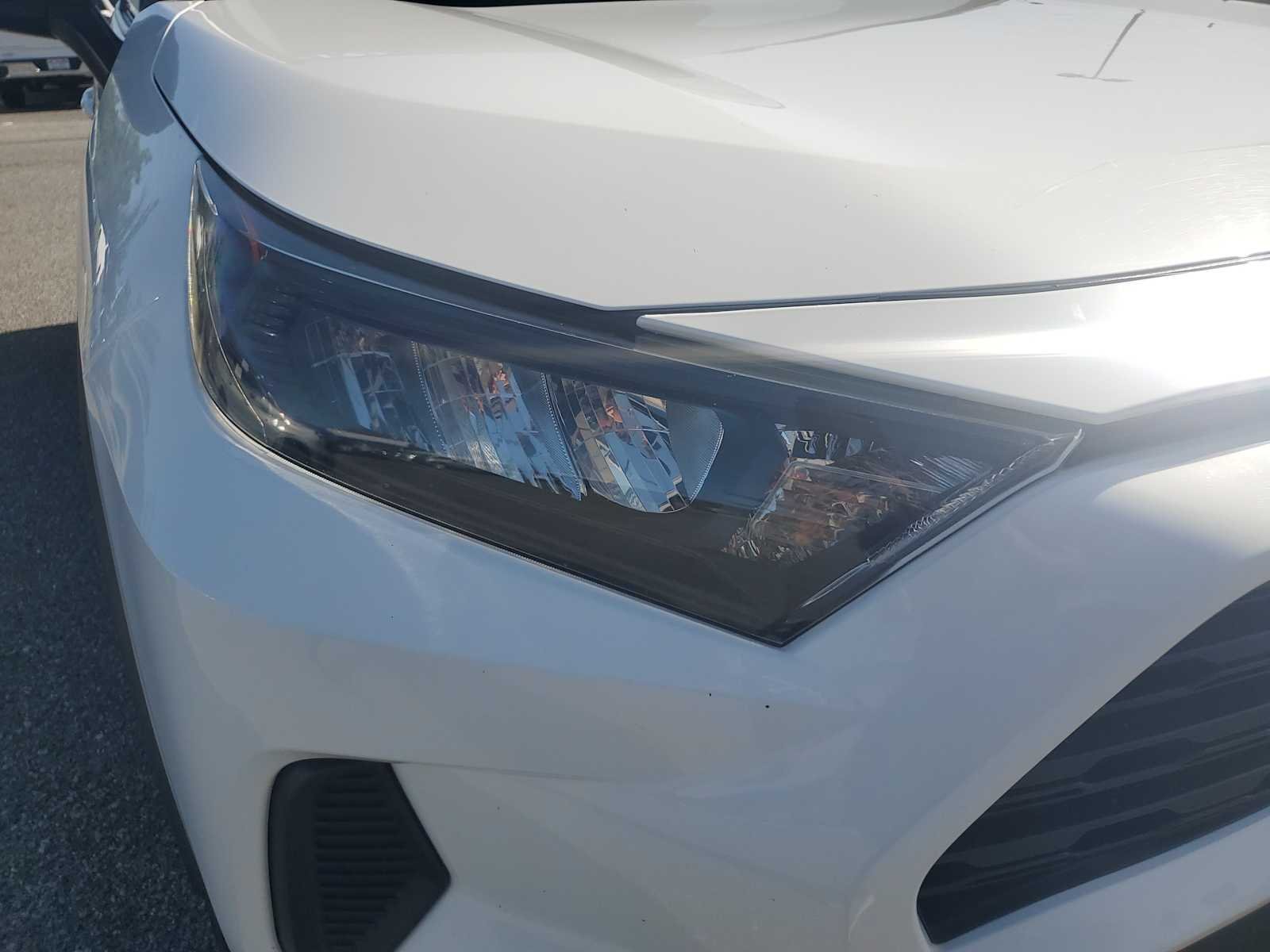 Used 2019 Super White White Toyota LE image 13