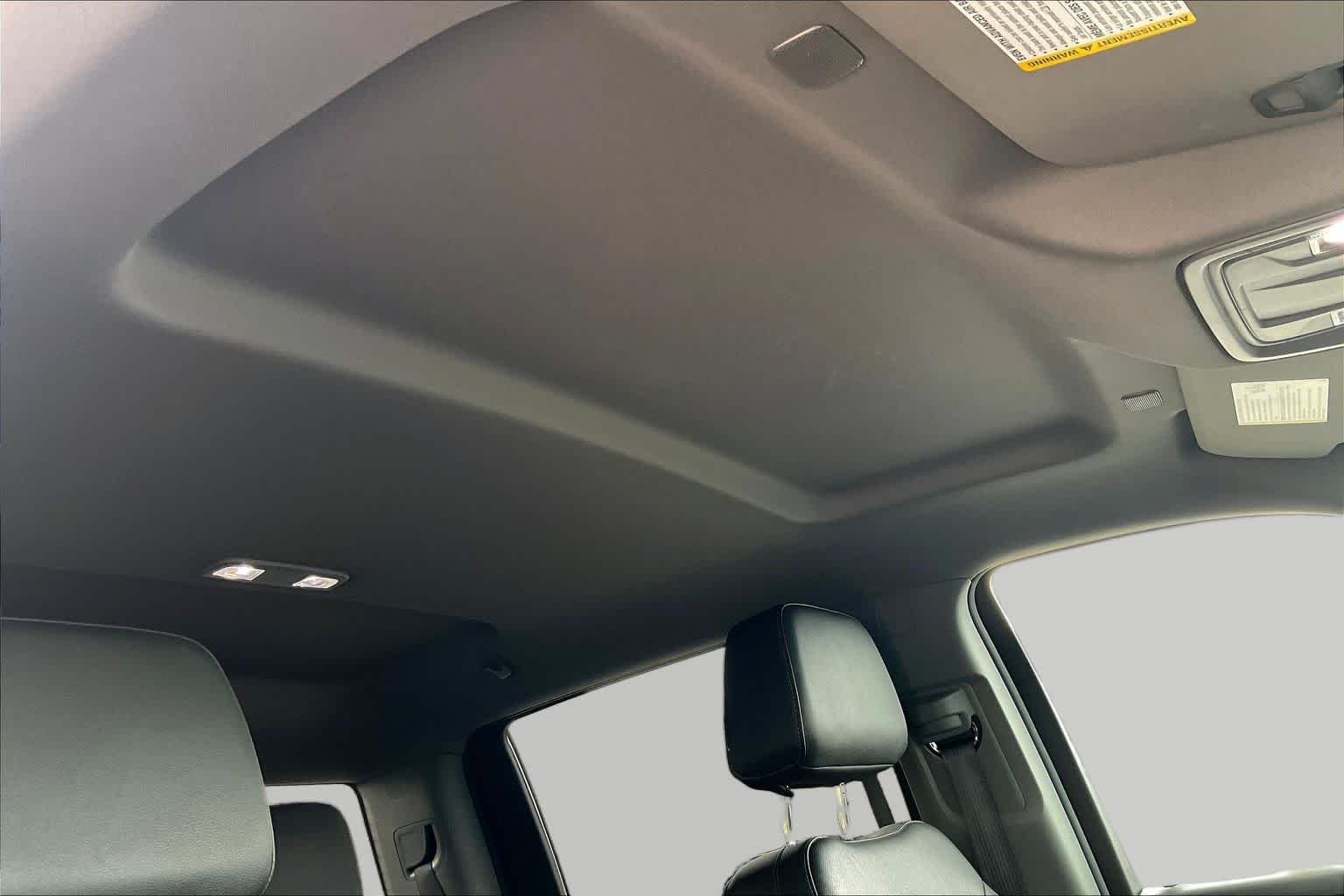 Used 2025 Titanium Rush Metallic GMC SLT image 13