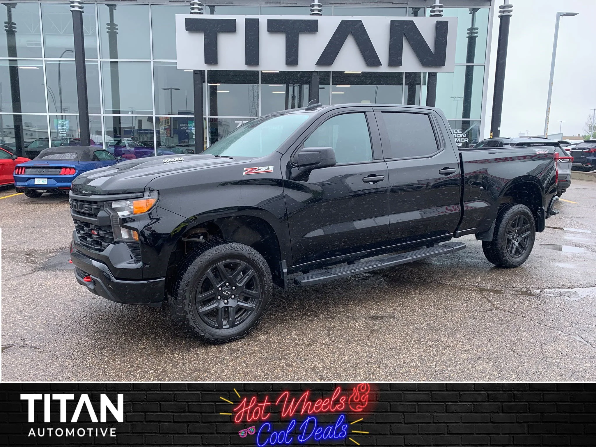 Certified Used 2024 Black Chevrolet Custom Trail Boss*3.0L Duramax | 6 Pass | Adaptive Cruise | Remote Start | 6ft Box | Tow Pkg image 1