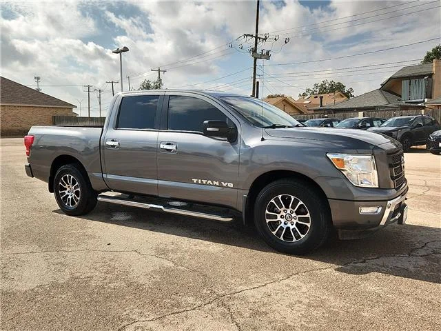 Used 2020 Gun Metallic Nissan SV (A9) 4x2 Crew Cab 5.5 ft. box 139.8 in. WB image 4