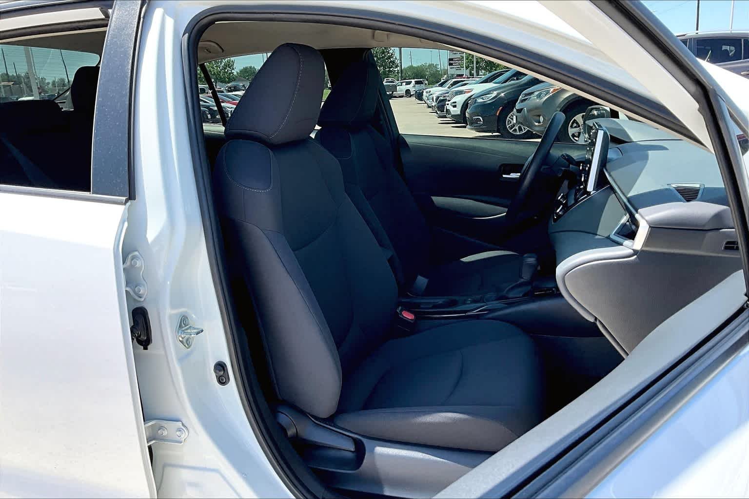 Used 2021 Super White Toyota LE image 9