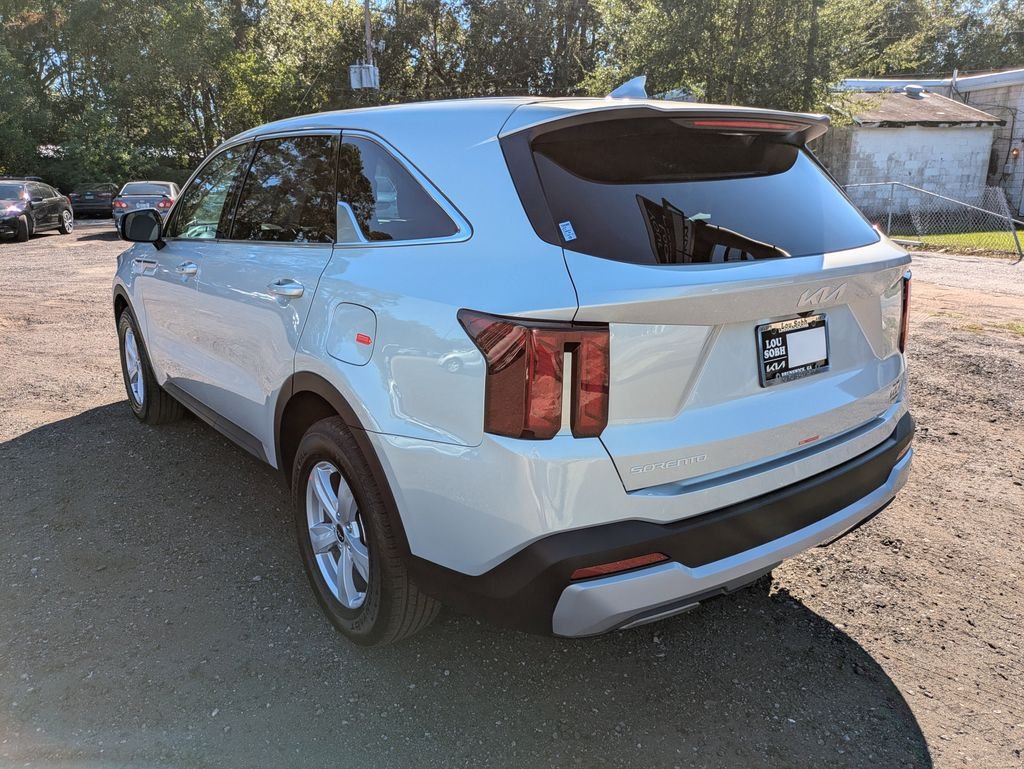 New 2026 Ivory Silver Kia LX image 5