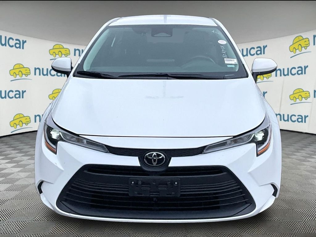 Used 2024 White Toyota LE image 2