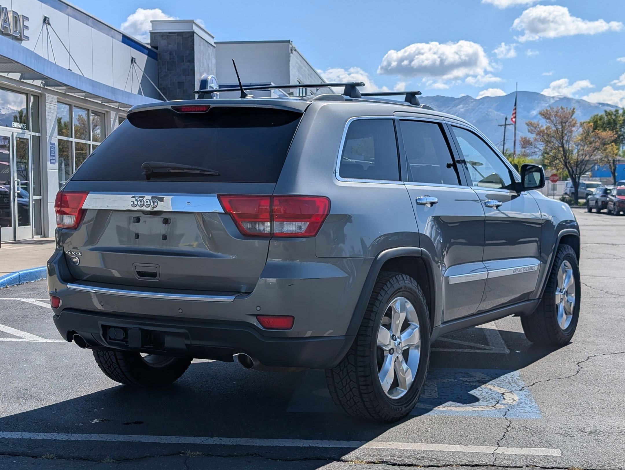 Used 2011 Mineral Gray Metallic Jeep Overland Summit image 3