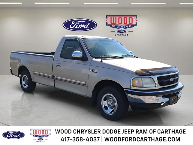Used 1997 Champagne Ford Lariat image 1