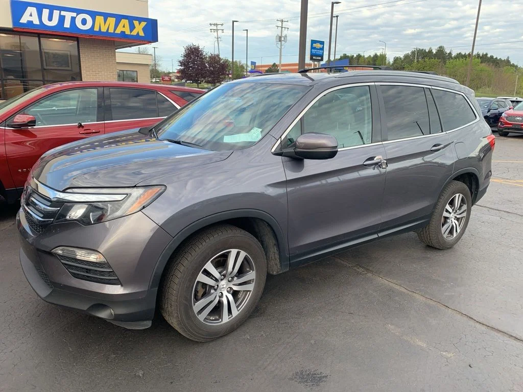Used 2016 Honda Pilot EX-L with VIN 5FNYF6H67GB094242 for sale in Traverse City, MI