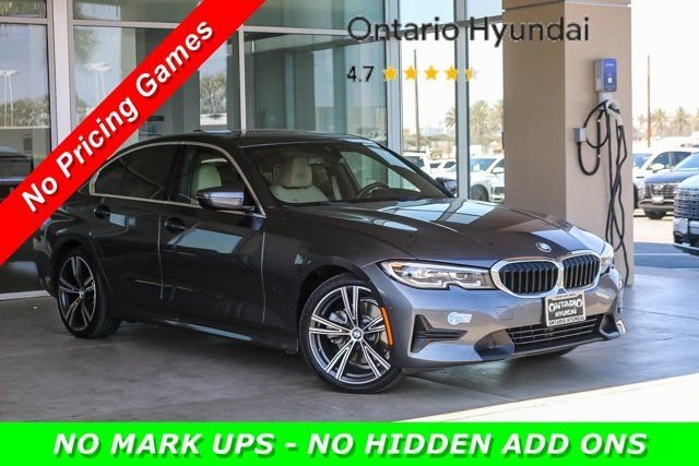 Used 2021 Gray BMW 330e iPerformance image 1