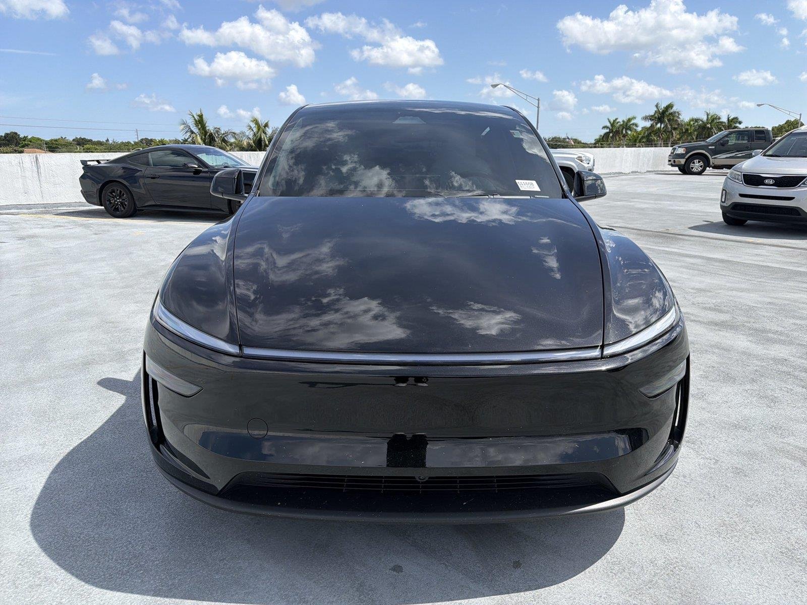 Used 2026 Tesla Model Y Long Range with VIN 7SAYGDEEXTA479334 for sale in Homestead, FL
